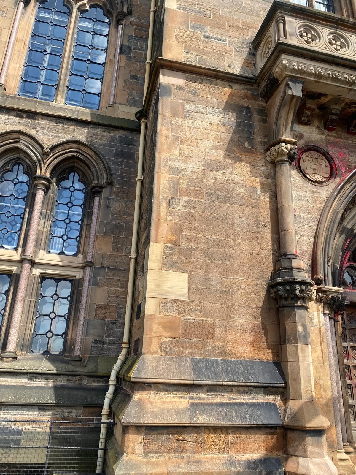 Restored heritage stonework detail on Gilbert Scott Building