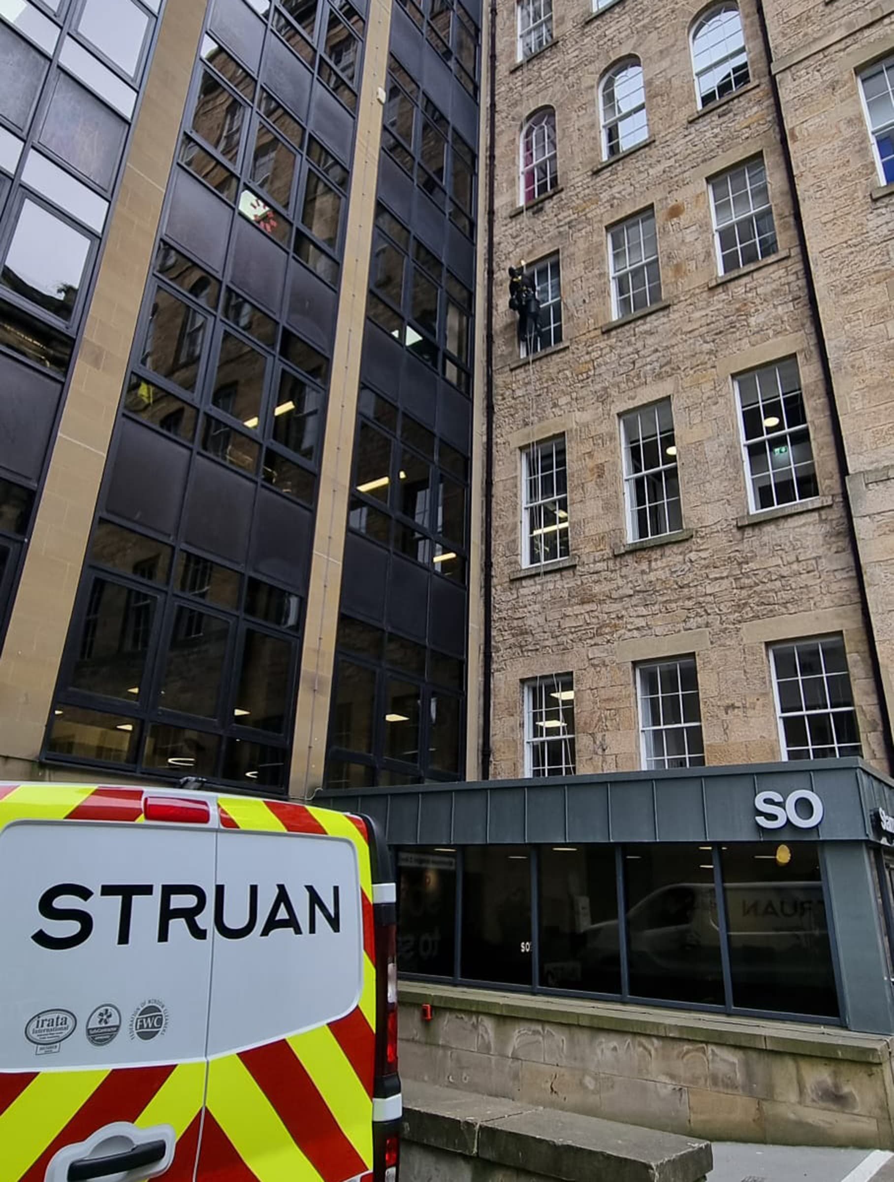 Rope access technicians on Edinburgh commercial building