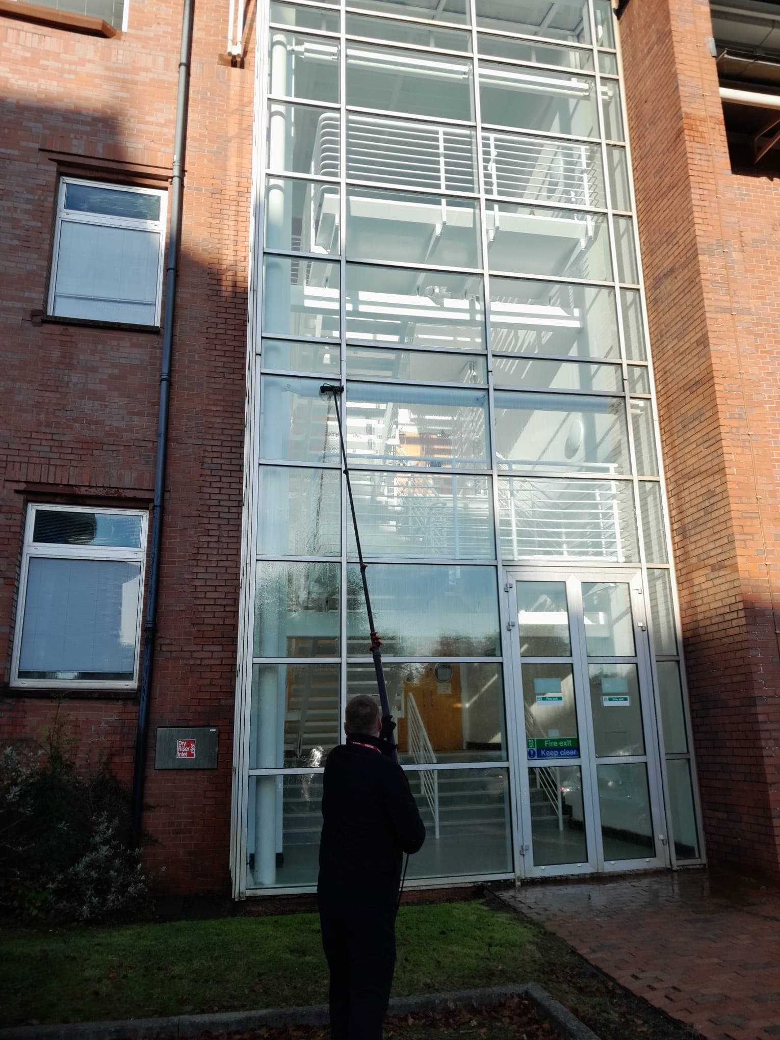 Water-fed pole reach and wash window cleaning